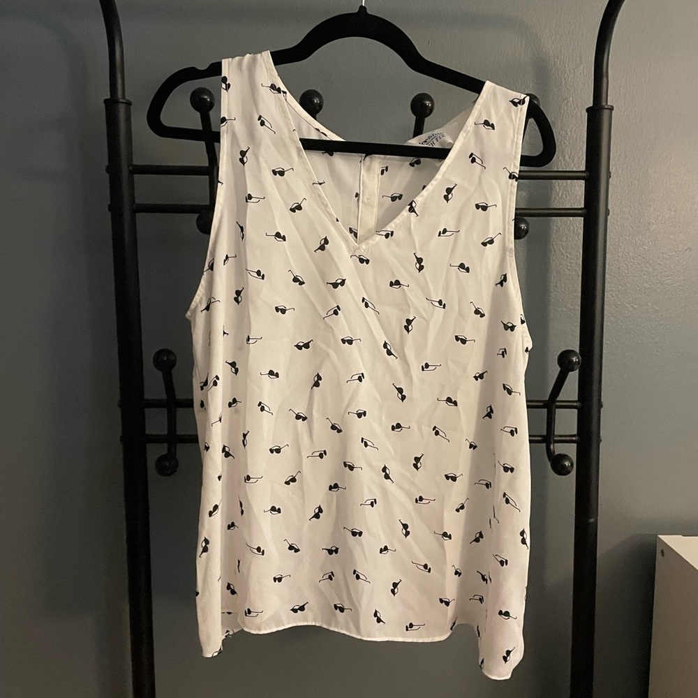 Sheer white patterned sleeveless top